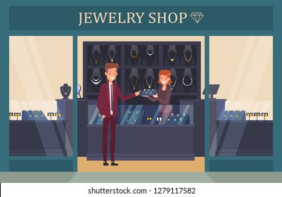 Jewelry shop showcase with man choosing ring