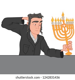 Jewish boy on Hanukkah, holding the lit menorah