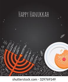 Jewish holiday Hanukkah background with menorah and doughnut over chalkboard 