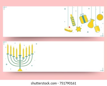 Jewish holiday Hanukkah with menorah (traditional Candelabra), donut and wooden dreidel (spinning top). Web Header or Banner.