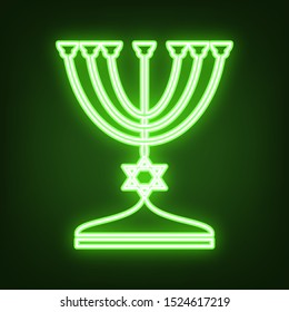 Jewish Menorah candlestick in black silhouette. Green neon icon in the dark. Blurred lightening. Illustration.