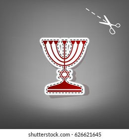 Jewish Menorah candlestick in black silhouette. Vector. Red icon with for applique from paper with shadow on gray background with scissors.