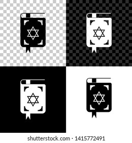 Jewish torah book icon isolated on black, white and transparent background. The Book of the Pentateuch of Moses. On the cover of the Bible is the image of the Star of David. Vector Illustration