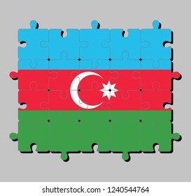 Jigsaw puzzle of Azerbaijan flag in blue red and green with a white crescent and big star. Concept of Fulfillment or perfection. 