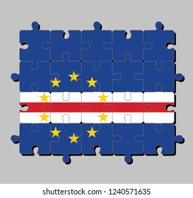 Jigsaw puzzle of Cape Verde flag in blue white and red color with the circle of ten star. Concept of Fulfillment or perfection.