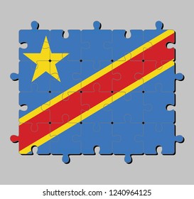 Jigsaw puzzle of Dr Congo flag in Sky blue field with diagonally red and yellow stripe and star. Concept of Fulfillment or perfection.