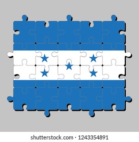 Jigsaw puzzle of Honduras flag in a horizontal triband of blue and white with five blue stars. Concept of Fulfillment or perfection.