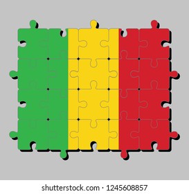 Jigsaw puzzle of Mali flag in a vertical tricolor of green gold and red. Concept of Fulfillment or perfection.