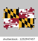 Jigsaw puzzle of Maryland flag in Heraldic banner of George Calvert, 1st Baron Baltimore. The states of America, Concept of Fulfillment or perfection.