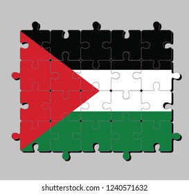 Jigsaw puzzle of Palestine flag in black white and green; with a red triangle based at the hoist. Concept of Fulfillment or perfection.