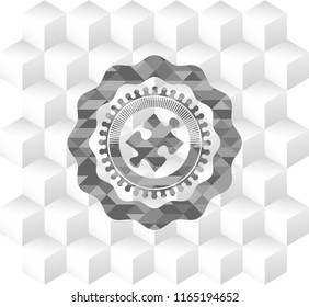 jigsaw puzzle piece icon inside grey emblem with geometric cube white background