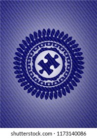 jigsaw puzzle piece icon inside emblem with jean high quality background