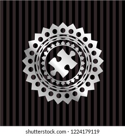 jigsaw puzzle piece icon inside silver shiny badge