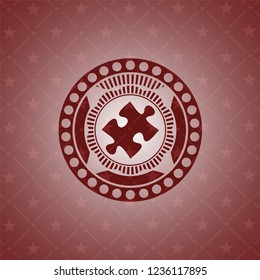 jigsaw puzzle piece icon inside red emblem