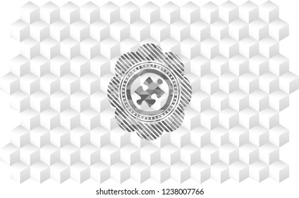jigsaw puzzle piece icon inside realistic grey emblem with geometric cube white background