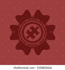 jigsaw puzzle piece icon inside red emblem
