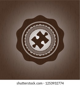 jigsaw puzzle piece icon inside wood emblem. Vintage.