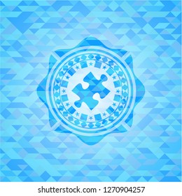 jigsaw puzzle piece icon inside light blue mosaic emblem