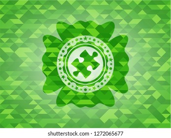 jigsaw puzzle piece icon inside green emblem with triangle mosaic background