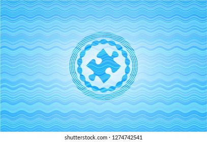 jigsaw puzzle piece icon inside light blue water badge.