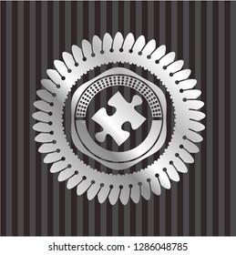 jigsaw puzzle piece icon inside silvery shiny badge