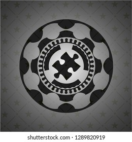 jigsaw puzzle piece icon inside dark emblem
