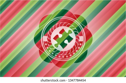 jigsaw puzzle piece icon inside christmas colors emblem.