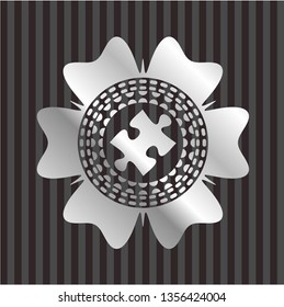 jigsaw puzzle piece icon inside silvery emblem or badge
