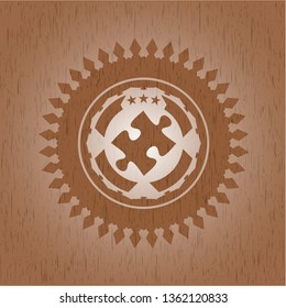 jigsaw puzzle piece icon inside wood emblem