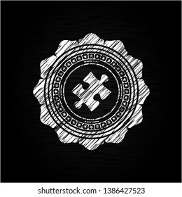jigsaw puzzle piece icon inside chalk emblem