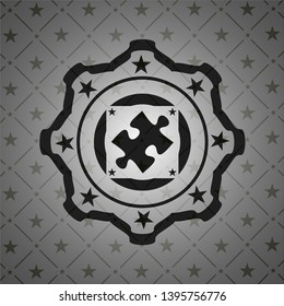 jigsaw puzzle piece icon inside dark emblem. Retro