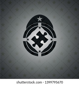 jigsaw puzzle piece icon inside dark emblem. Retro