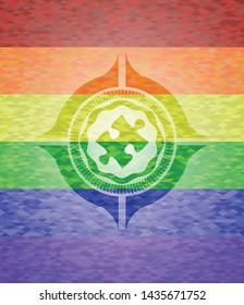 jigsaw puzzle piece icon inside lgbt colors emblem 