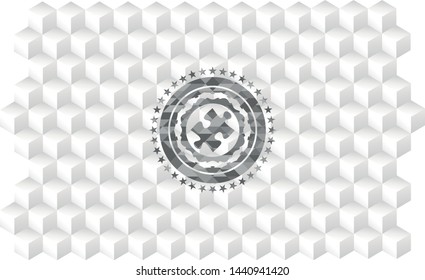 jigsaw puzzle piece icon inside realistic grey emblem with geometric cube white background