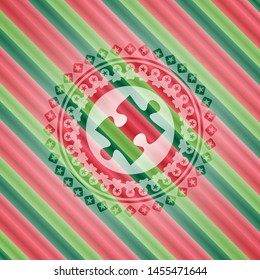 jigsaw puzzle piece icon inside christmas colors emblem.