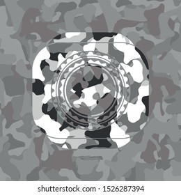 jigsaw puzzle piece icon inside grey camo texture