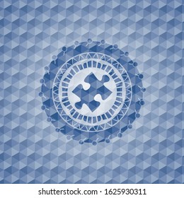jigsaw puzzle piece icon inside blue emblem with geometric pattern background.