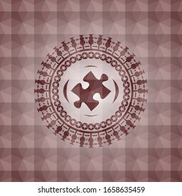 jigsaw puzzle piece icon inside red seamless badge with geometric pattern.