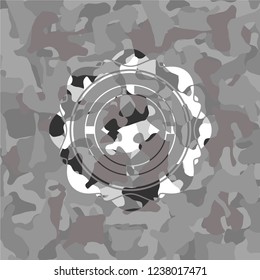 jigsaw puzzle piece icon on grey camo pattern