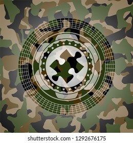 jigsaw puzzle piece icon on camo texture