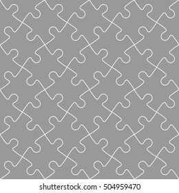 Jigsaw puzzle seamless background. Mosaic of grey puzzle pieces with white outline in diagonal arrangement. Simple flat vector illustration.