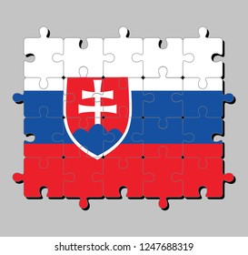 Jigsaw puzzle of Slovakia flag in white blue and red; charged with a shield containing a white cross is placed to left of center. Concept of Fulfillment or perfection.