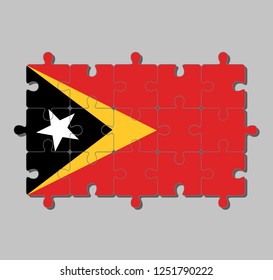 Jigsaw puzzle of Timor Leste flag in red yellow and black color with white star. Concept of Fulfillment or perfection.