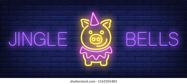 Jingle bells neon text with funny pig. New Year day and Christmas design. Night bright neon sign, colorful billboard, light banner. Vector illustration in neon style.