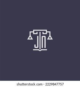 JN initial monogram for lawfirm logo with scales vector image