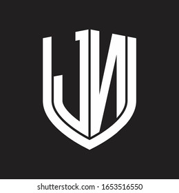 Monograma del logotipo JN con diseño de escudo de emblemas aislado en fondo negro