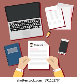 Job interview concept with business resume on red background.