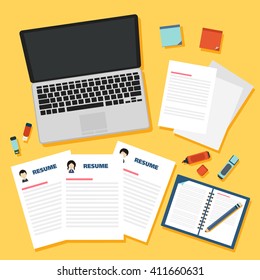 Job interview concept with business resume on yellow background.