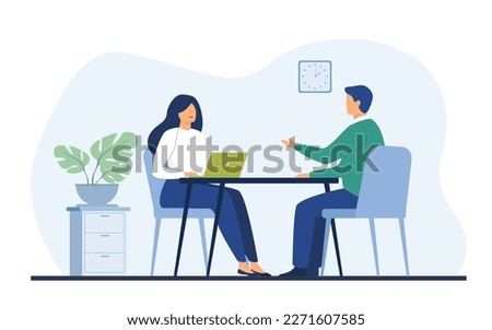 Job interview conversation HR managers and employee candidates met and talked. A man and woman are sitting at a table and discussing careers. Business or human resource concept