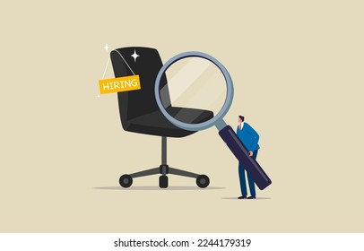 Job Search, employment, career, candidates, companies, applying for a job. Businessman with magnifying glass searching for vacancies.